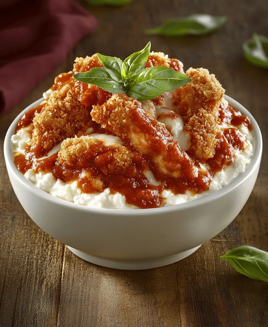 Welcome to the world of comfort food reimagined! The Cheesy Chicken Parm Cottage Cheese Bowl is a delightful dish that takes traditional chicken Parmesan and places it in a cozy, nutritious bowl, perfect for any meal of the day. This innovative recipe combines the classic flavors of Italian cuisine with the creamy goodness of cottage cheese, creating a satisfying meal that's both hearty and healthy.