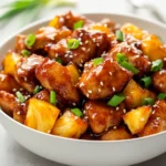 Exploring an irresistible fusion of flavors, Sweet and Sticky Pineapple Chicken is a delightful dish that marries tender chicken thighs with the sweetness of pineapple, creating a savory meal that everyone will love. The combination of juicy pineapple chunks with a sticky, flavorful sauce elevates standard chicken fare to exceptional new heights. This dish showcases a harmonious blend of tangy, sweet, and spicy elements, making it a perfect choice for weeknight dinners or special occasions.