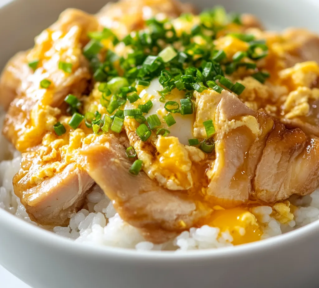 Oyakodon is a cherished Japanese dish known for its delicious combination of chicken, eggs, and rice, creating a warm and comforting meal that many people adore. This savory rice bowl offers a wonderful balance of textures and flavors, with tender chicken and creamy eggs enveloped in a rich sauce, all served over a bed of freshly cooked short-grain rice. This dish is not only beloved in Japan but has also gained a significant following internationally, celebrated both for its simplicity and its satisfying nature.