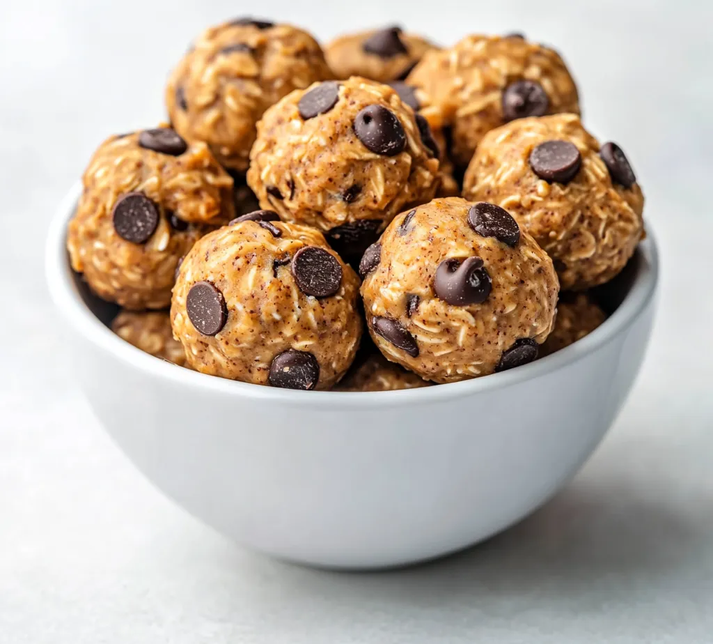 Peanut Butter Chocolate Chip Oatmeal Energy Bites are a delicious and nutritious option for anyone looking to fuel their day with wholesome ingredients. These small bites unite the heartiness of rolled oats, the richness of peanut butter, and the sweet touch of chocolate chips, creating a snack that is both satisfying and energizing. Whether you're rushing out the door in the morning or need a quick snack for the afternoon slump, these energy bites serve as a perfect solution.