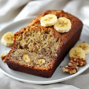 Banana bread has long been a cherished comfort food, often associated with cozy mornings filled with delightful aromas that fill the kitchen, creating the perfect setting for a relaxed start to the day. This beloved recipe stands the test of time, evoking feelings of nostalgia for many who have enjoyed a warm slice straight from the oven. Its history traces back to the Great Depression, a time when households sought to maximize every ingredient, leading to the ingenious creation of banana bread, a simple yet satisfying use of overripe bananas.