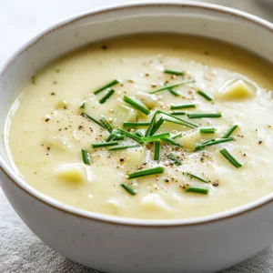 The comforting embrace of a warm soup can transform any meal, especially during cooler days. Creamy Leek and Potato Delight stands out as a quintessential comfort food that not only warms the soul but also delights the palate. This soup combines the delicate flavors of leeks with hearty potatoes, elevated by a luscious creamy texture. The gentle sweetness of leeks perfectly offsets the earthiness of the potatoes, creating a well-balanced bowl that is both nourishing and satisfying. The addition of heavy cream brings a decadent richness that elevates it beyond a standard vegetable soup.