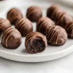 The delightful blend of peanut butter, cream cheese, and Oreos creates a symphony of flavors in the Peanut Butter Oreo Delight Truffles, a treat that is as pleasing to the palate as it is visually enticing. These truffles boast a creamy core wrapped in a rich chocolate shell that makes them an irresistible option for dessert enthusiasts of all ages. They are perfect for a variety of occasions, be it a festive gathering, an elegant dinner party, or a cozy night in spent with family.