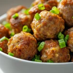 Sizzling Sausage Ball Delights stand out as a quintessential American appetizer that brings joy to any gathering. These delectable bites blend the savory essence of ground sausage with the rich, creamy texture of sharp cheddar cheese, resulting in a combination that is both comforting and exciting. The unique addition of green onions and garlic powder adds depth, making these sausage balls not just tasty, but memorable.