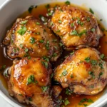 Spicy Honey-Glazed Chicken Thighs present a culinary experience that combines succulence with a sweet and spicy twist. The harmony between the glaze's sweetness and the heat from the hot sauce creates a delightful dish that is more than just a meal; it's a flavor-packed adventure on your plate. This dish is perfect for various occasions: whether it's a family dinner, a weekend gathering, or even a cozy night in, it caters to every palate craving something deliciously different.